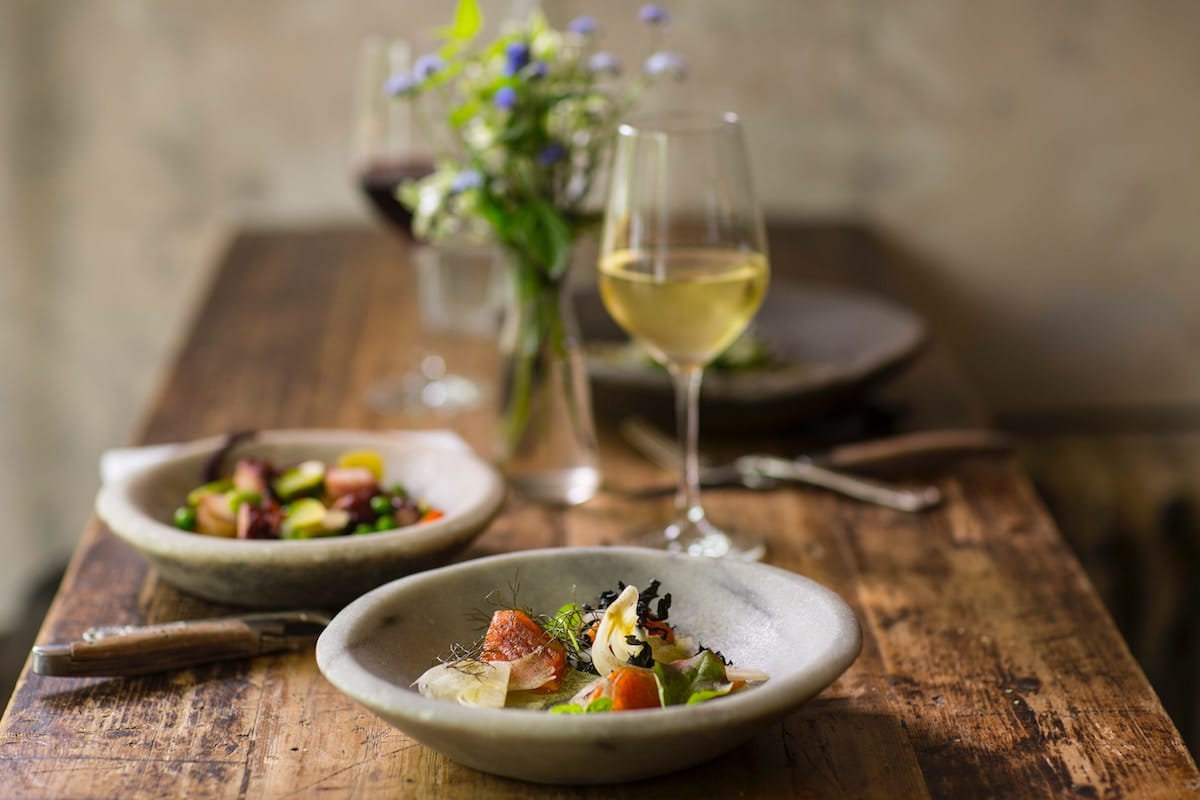 photo of dinner table and wine